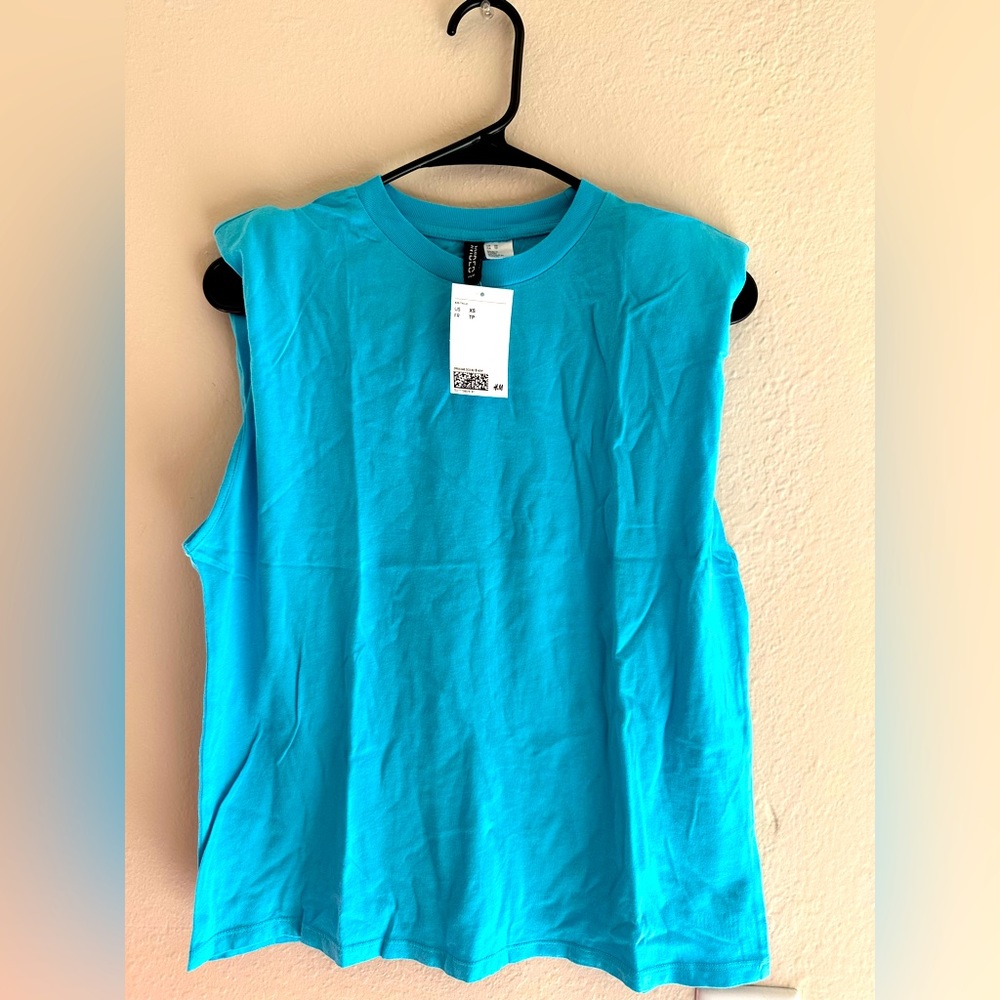 Bright blue top from H&M on sale- new with tags!